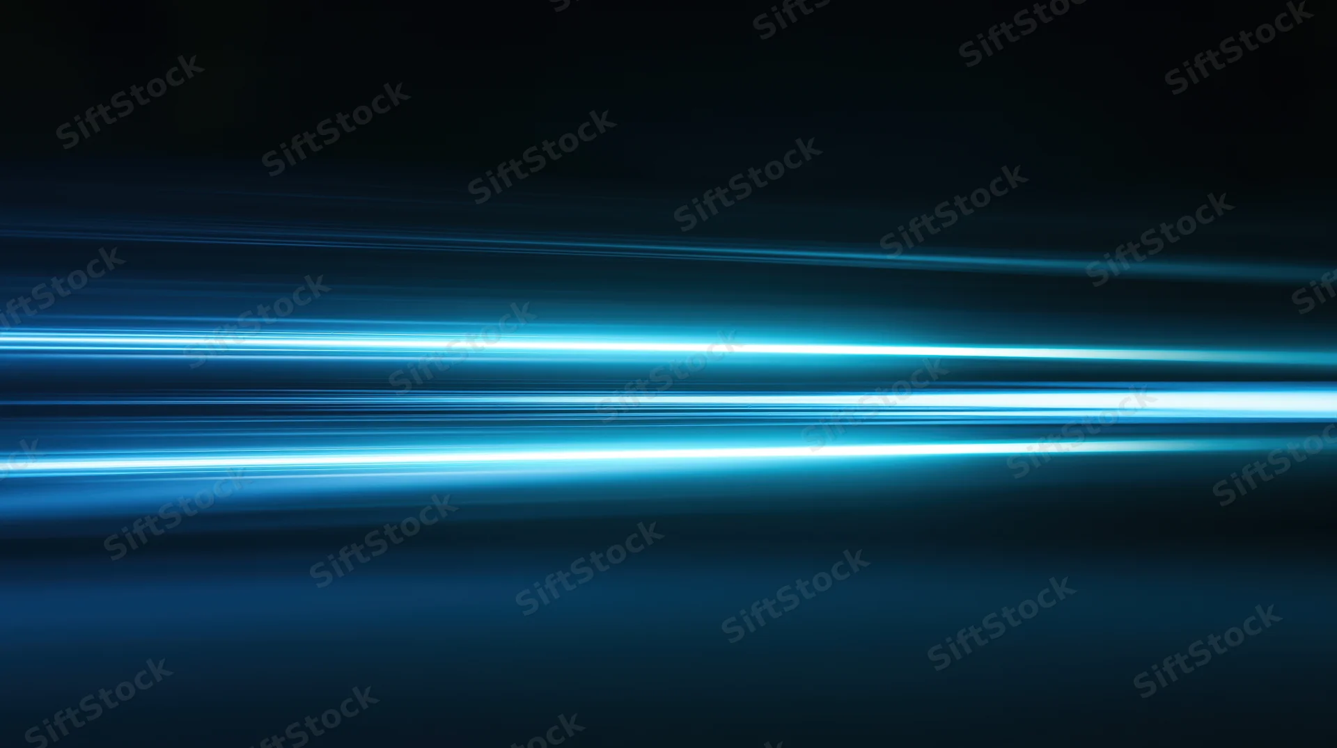 Horizontal blue light streaks glowing across a dark background with motion blur