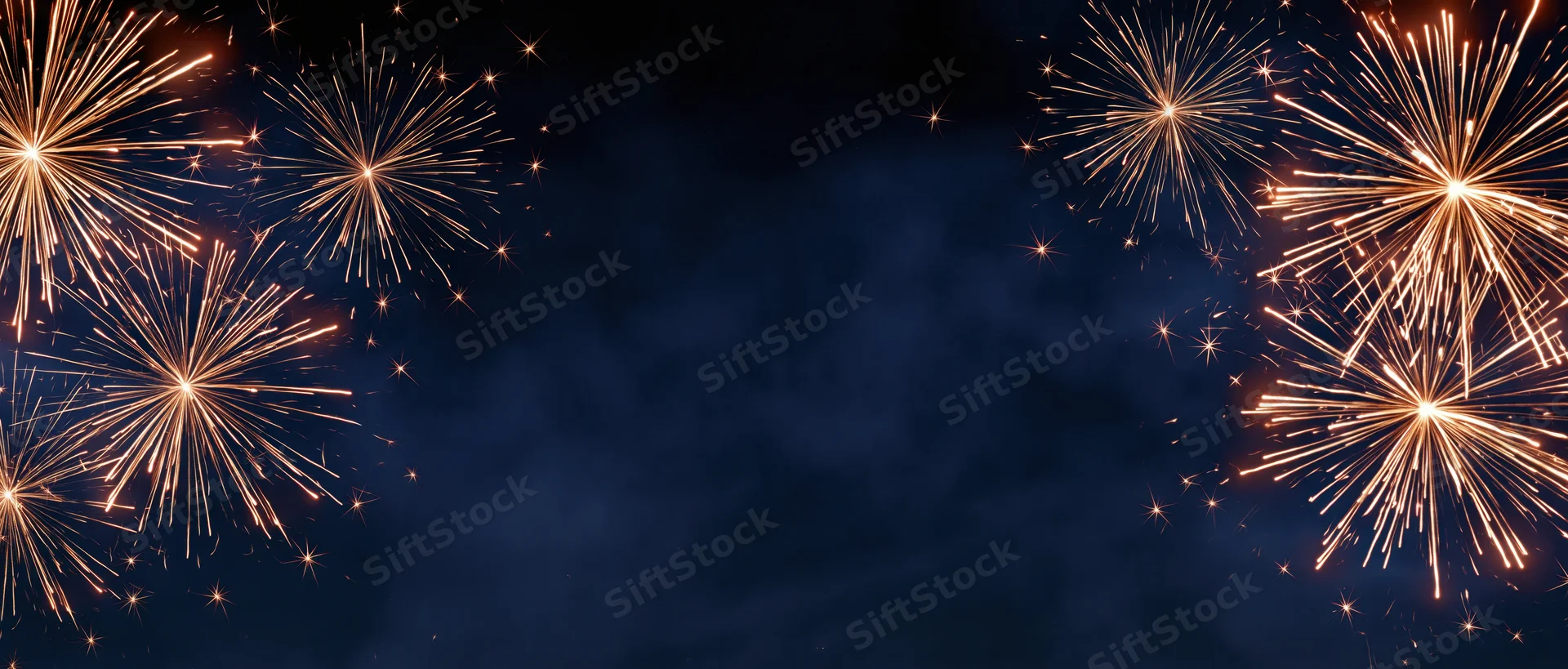Fireworks exploding in golden bursts across dark night sky with central copyspace