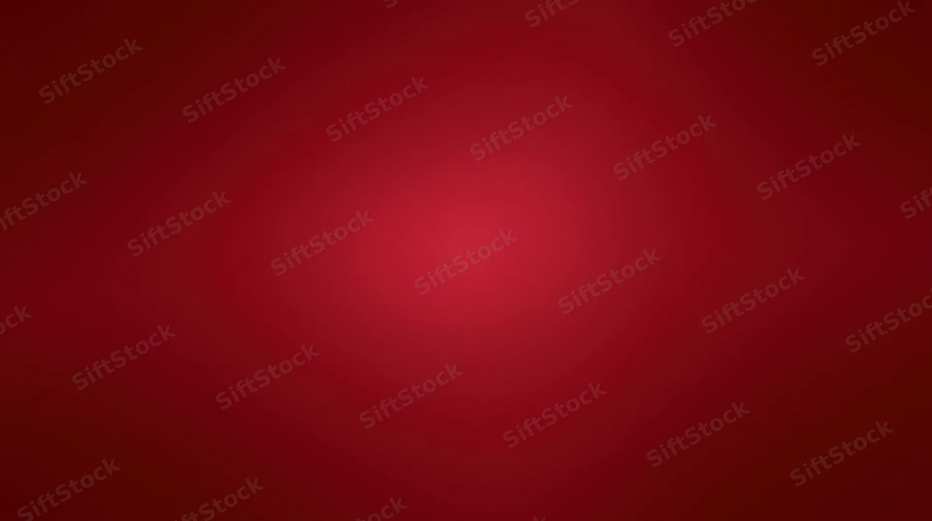 A smooth red gradient background with a soft radial glow at the center