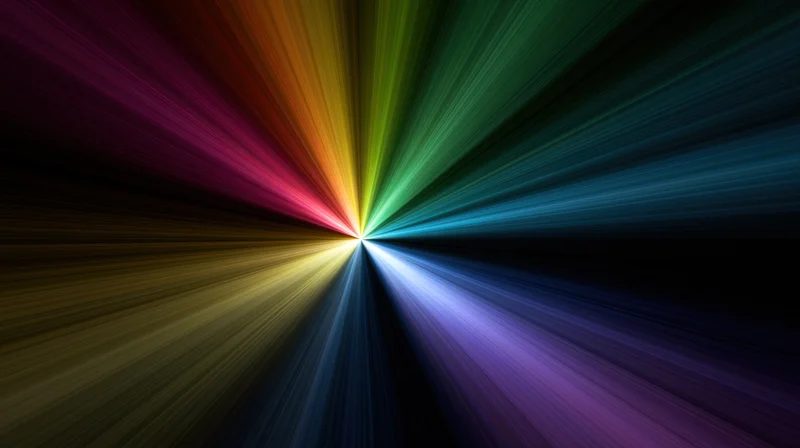 Radiant beams of multicolored light bursting from a central point in a dark space