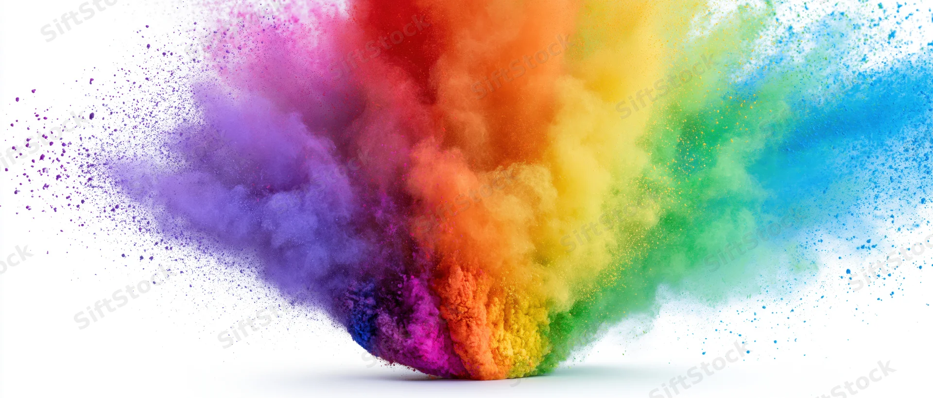 Colorful powder exploding in rainbow burst against white background