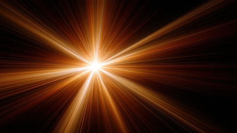 Radiant light burst with golden rays emanating from center against dark background