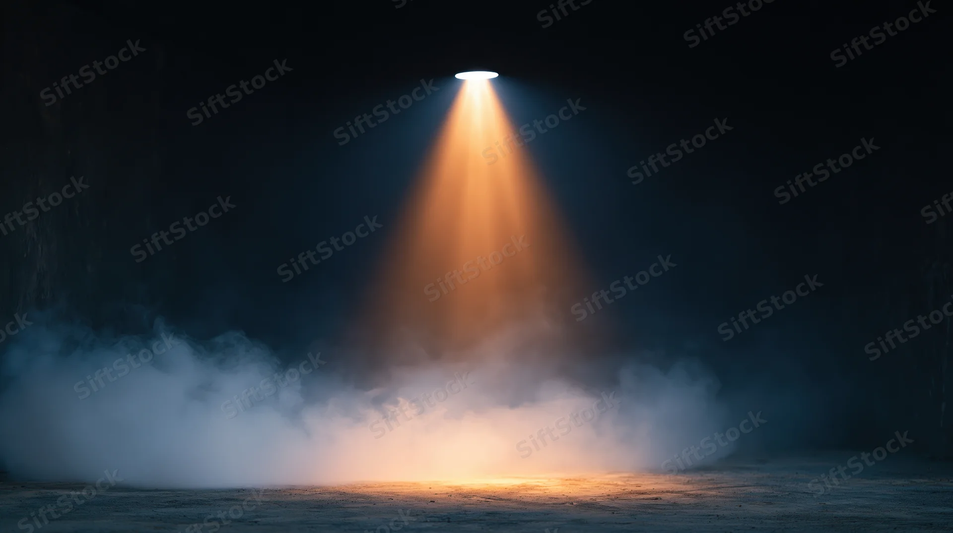 Spotlight beam cutting through smoke in a dark space