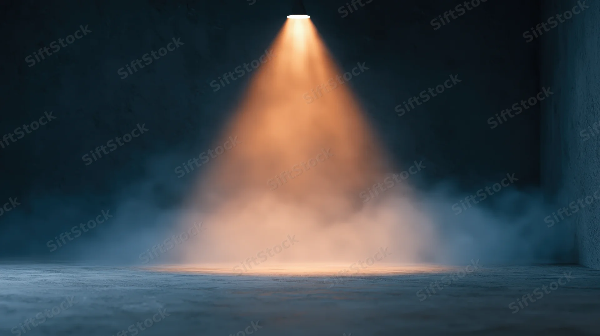 Warm spotlight beam illuminating smoke in dark empty industrial space