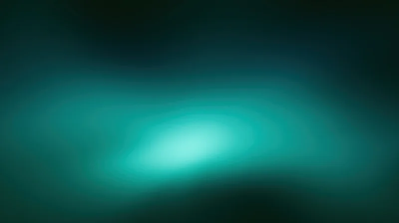Abstract teal gradient with soft glow and blurred edges