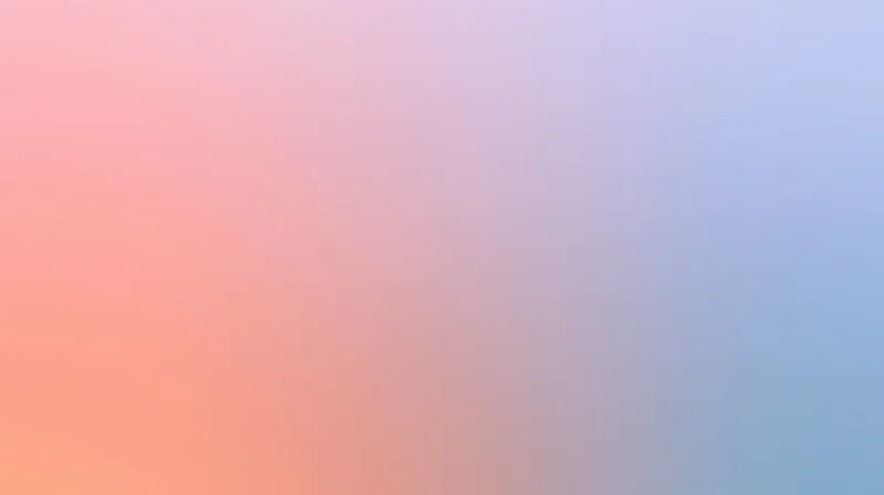 A smooth color gradient transitioning from pink and orange to blue and purple across the frame
