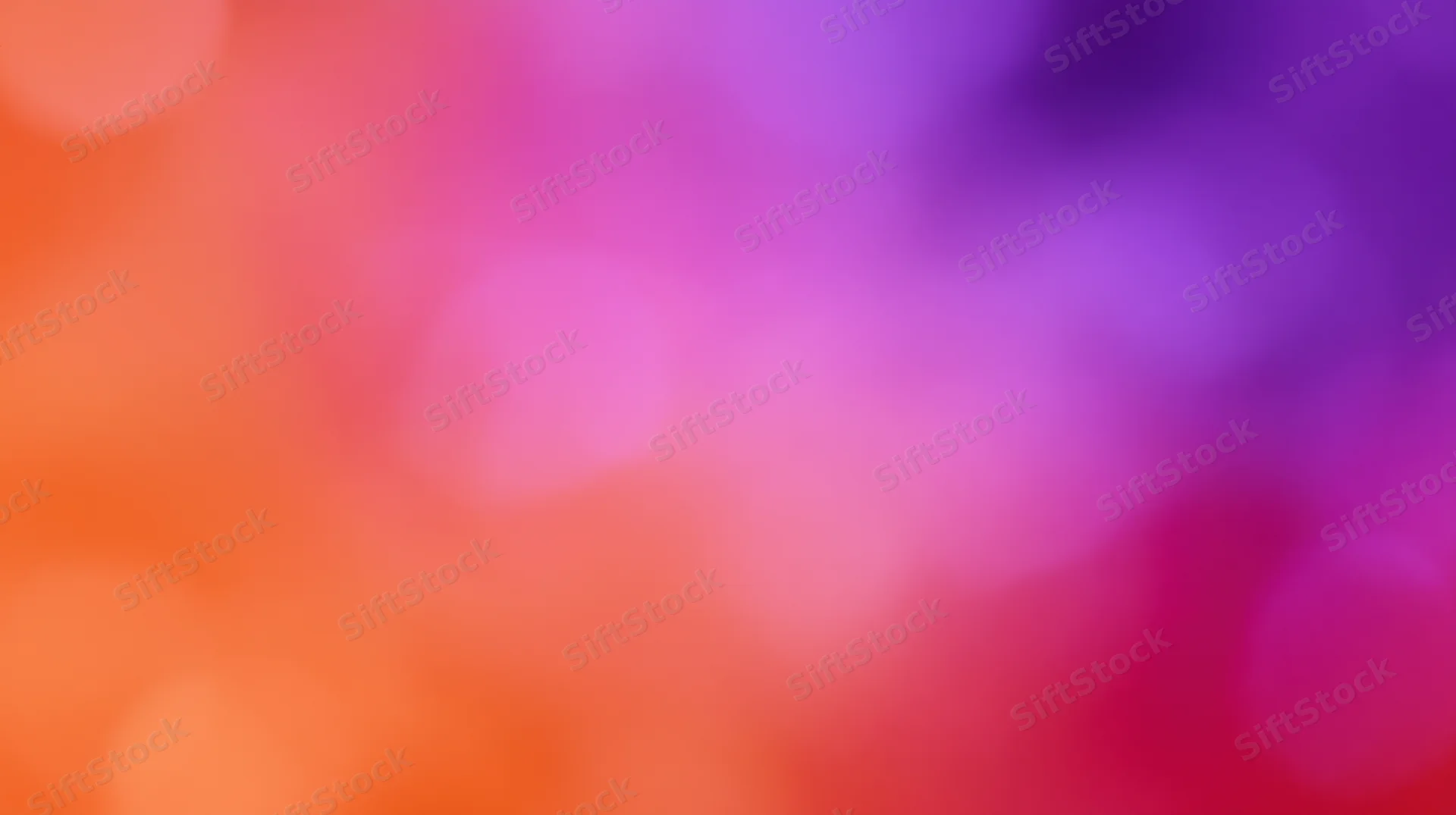 Blurred colorful bokeh lights forming a soft gradient background