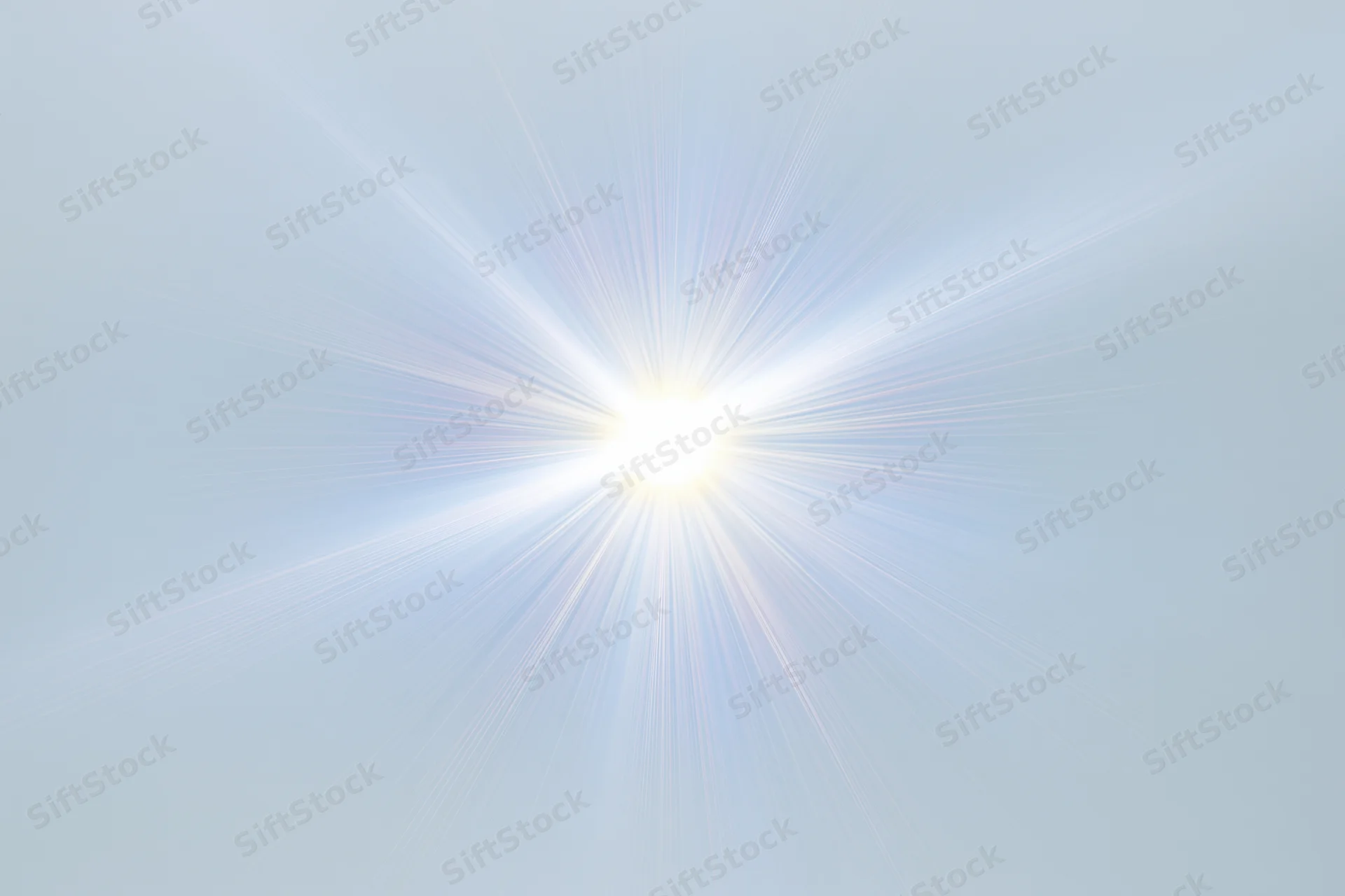 Bright lens flare starburst radiating from center on white background