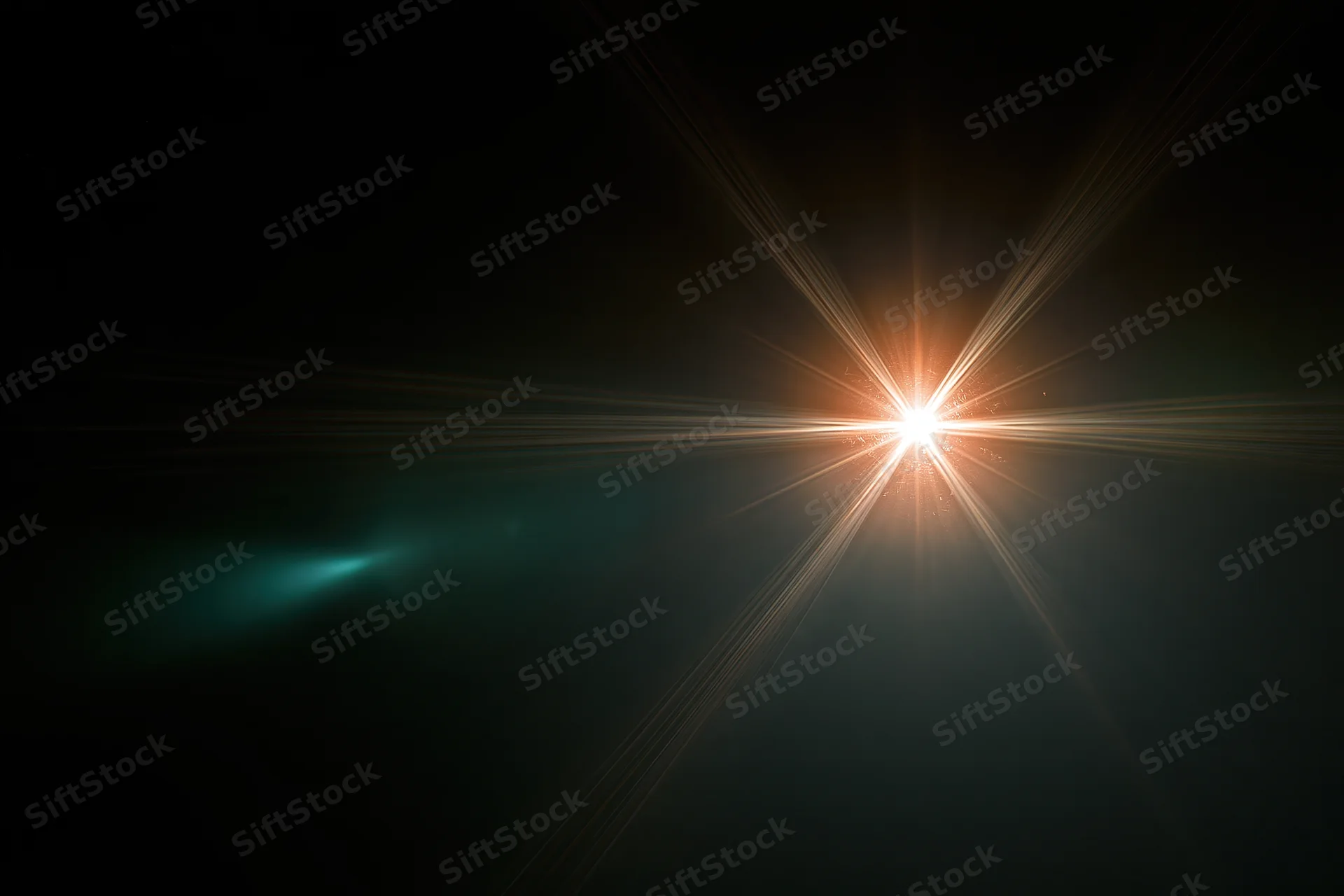 Bright point light source glowing with starburst rays against dark background