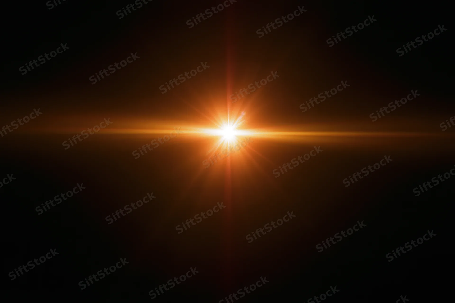 Intense orange-gold lens flare streak cutting horizontally across dark background