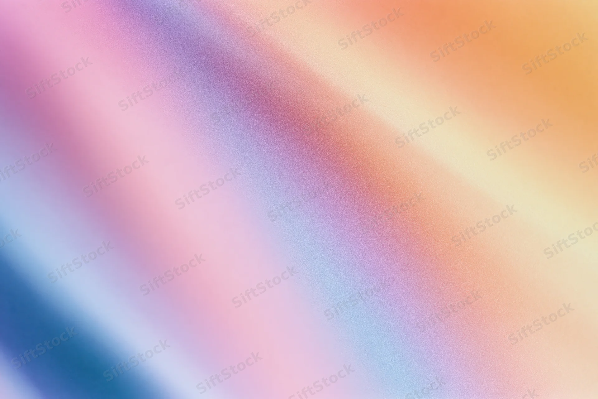 Smooth diagonal gradient of pastel colors blending across the frame as a background texture