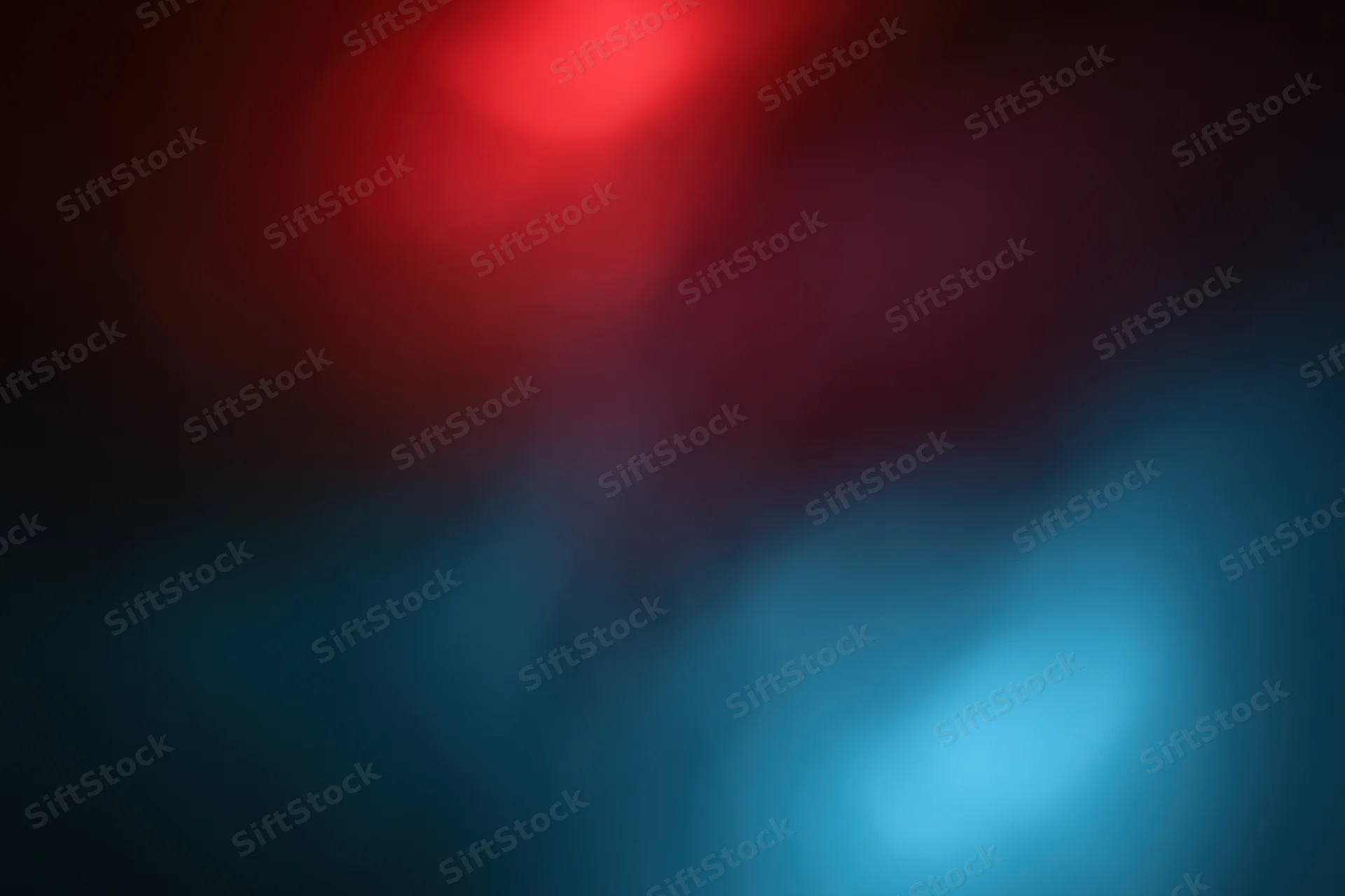 Abstract blurred background with red and blue glowing lights