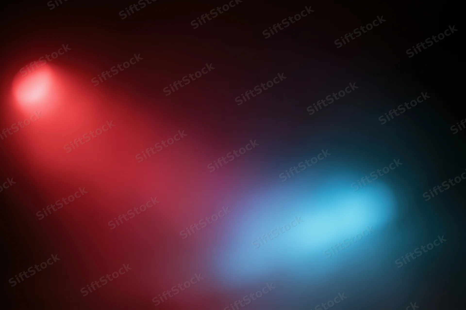 Abstract blurred background with red and blue glowing lights