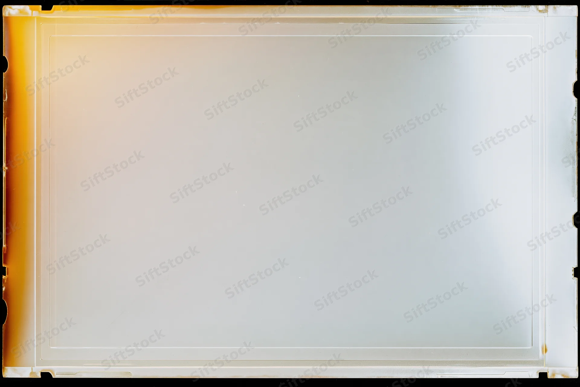 Blank exposed film scan lying flat in extreme closeup filling frame