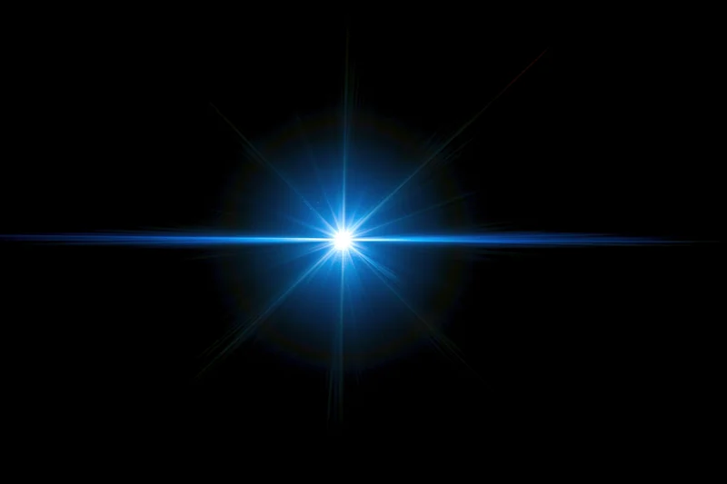 Bright blue lens flare burst centered on pure black background