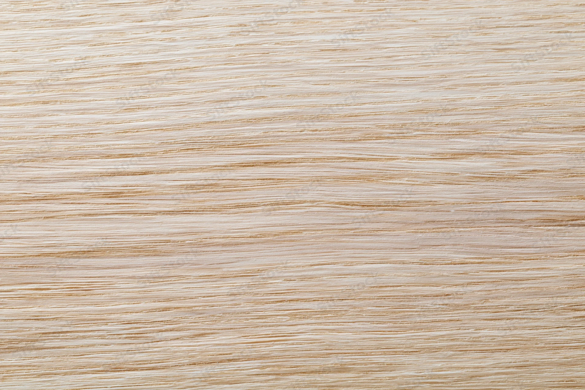Close-up flat lay of a light bleached oak wood surface with fine grain texture