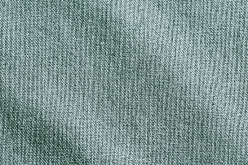 Close-up flat lay of plain woven fabric filling the frame