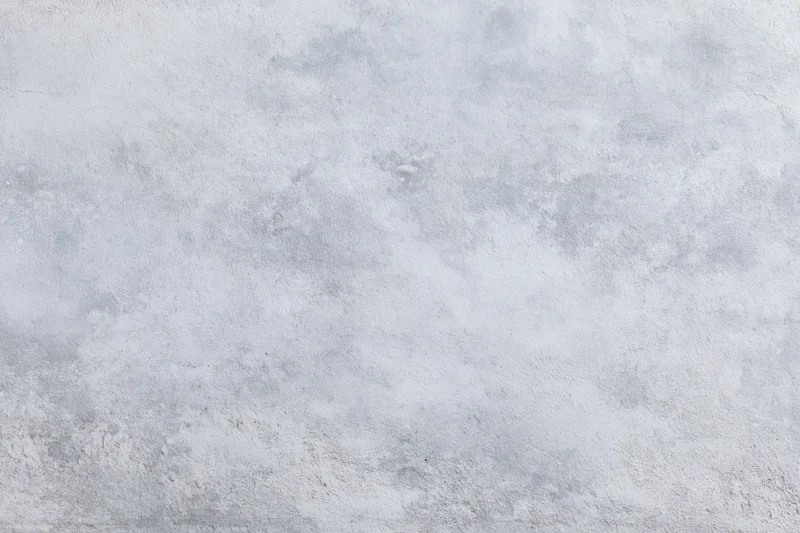 Close-up of a bare concrete wall surface filling the frame