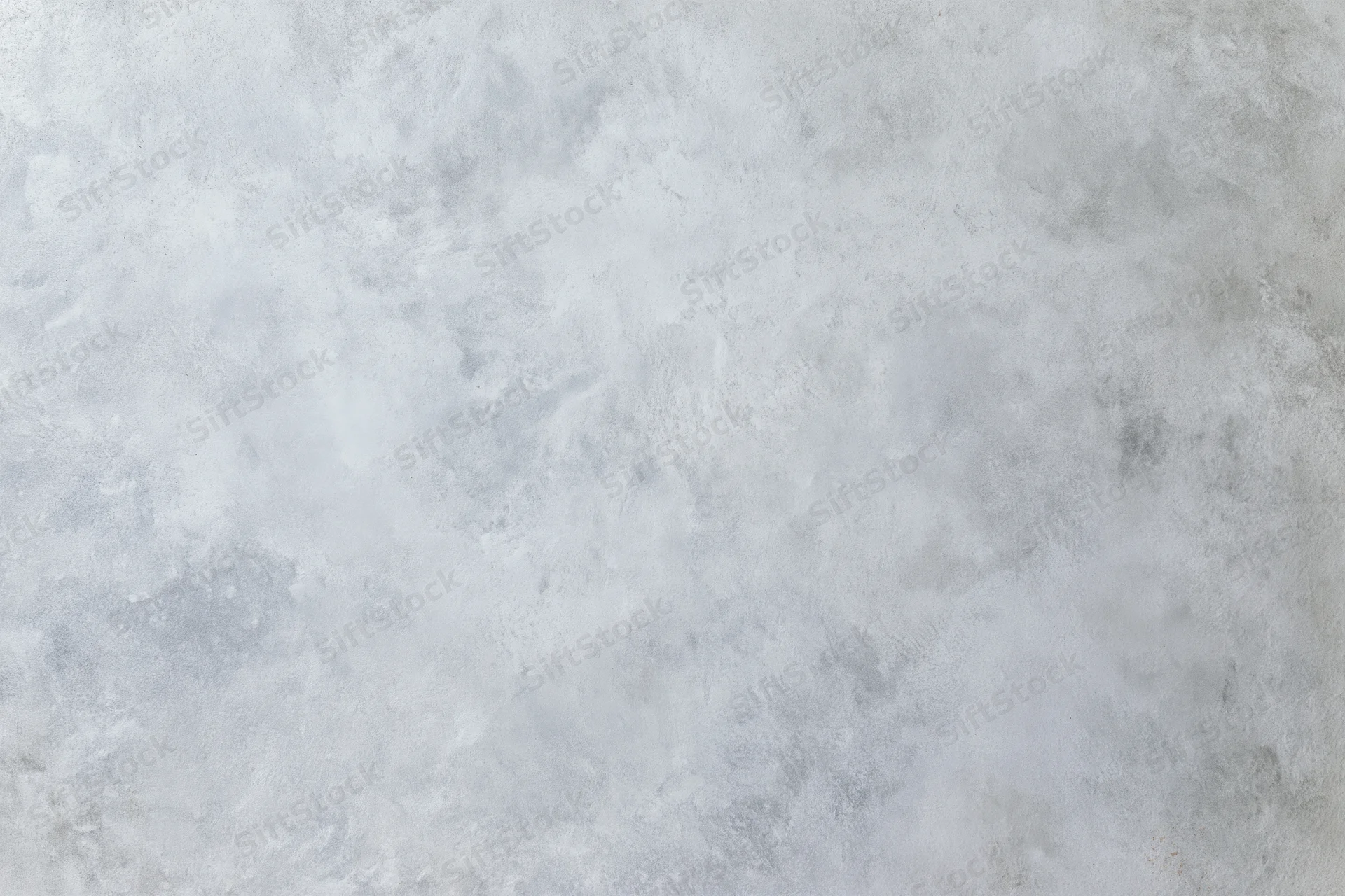Close-up of a bare concrete wall surface with rough texture filling the frame