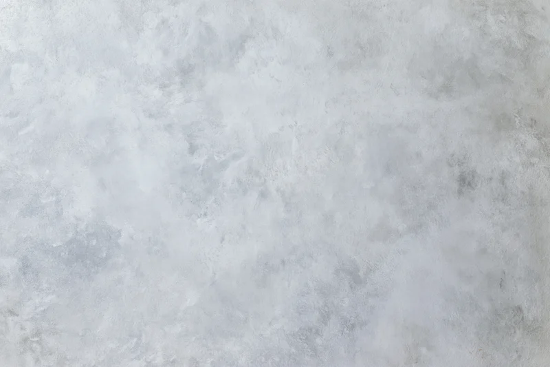 Close-up of a bare concrete wall surface with rough texture filling the frame