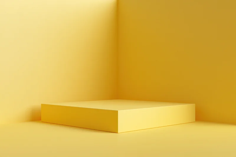 Yellow minimalist pedestal in corner studio space for product display