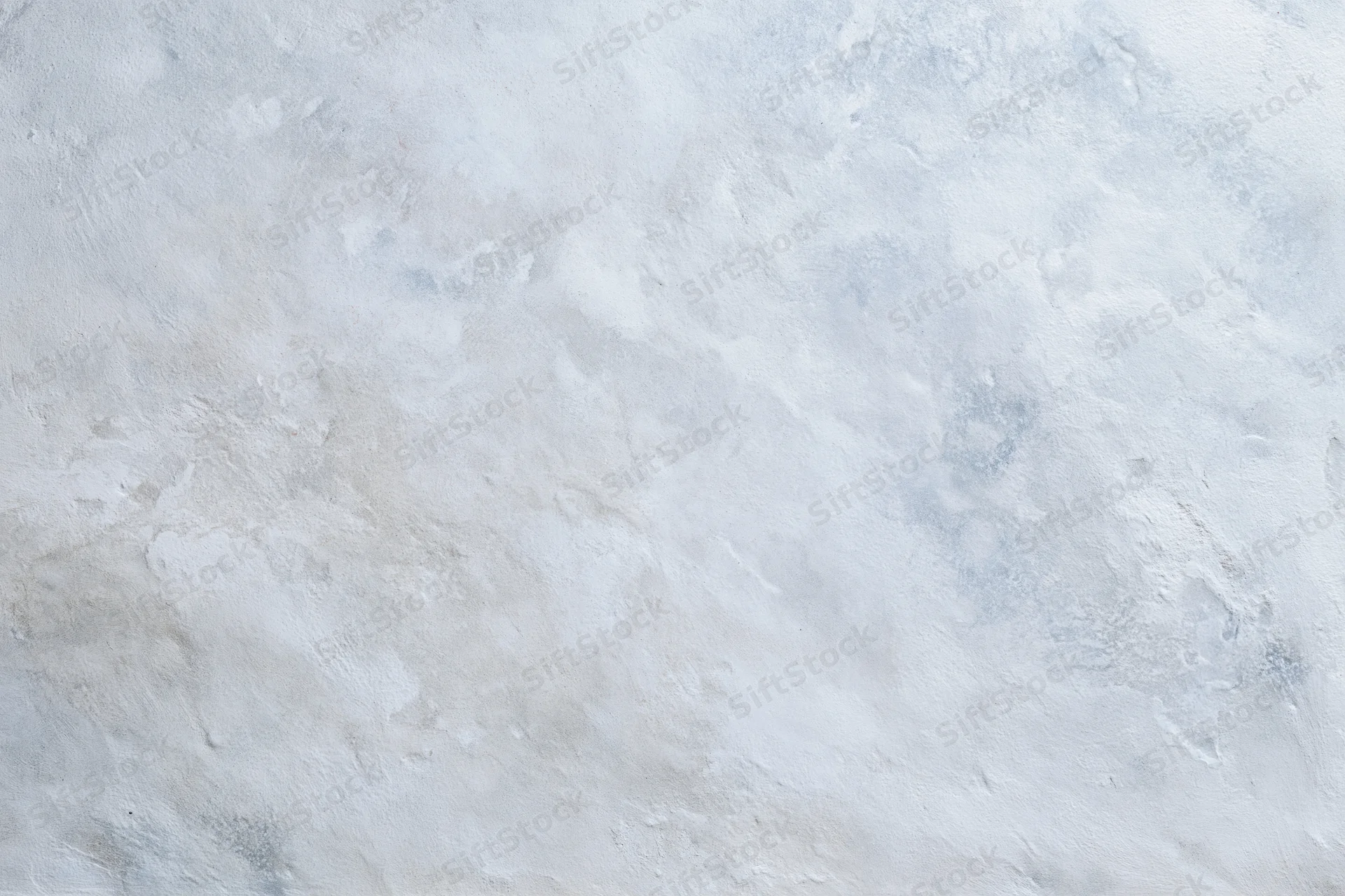 Flat concrete wall surface filling the frame in close-up view