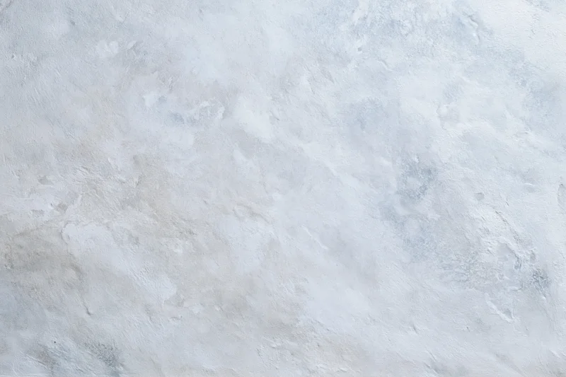 Flat concrete wall surface filling the frame in close-up view