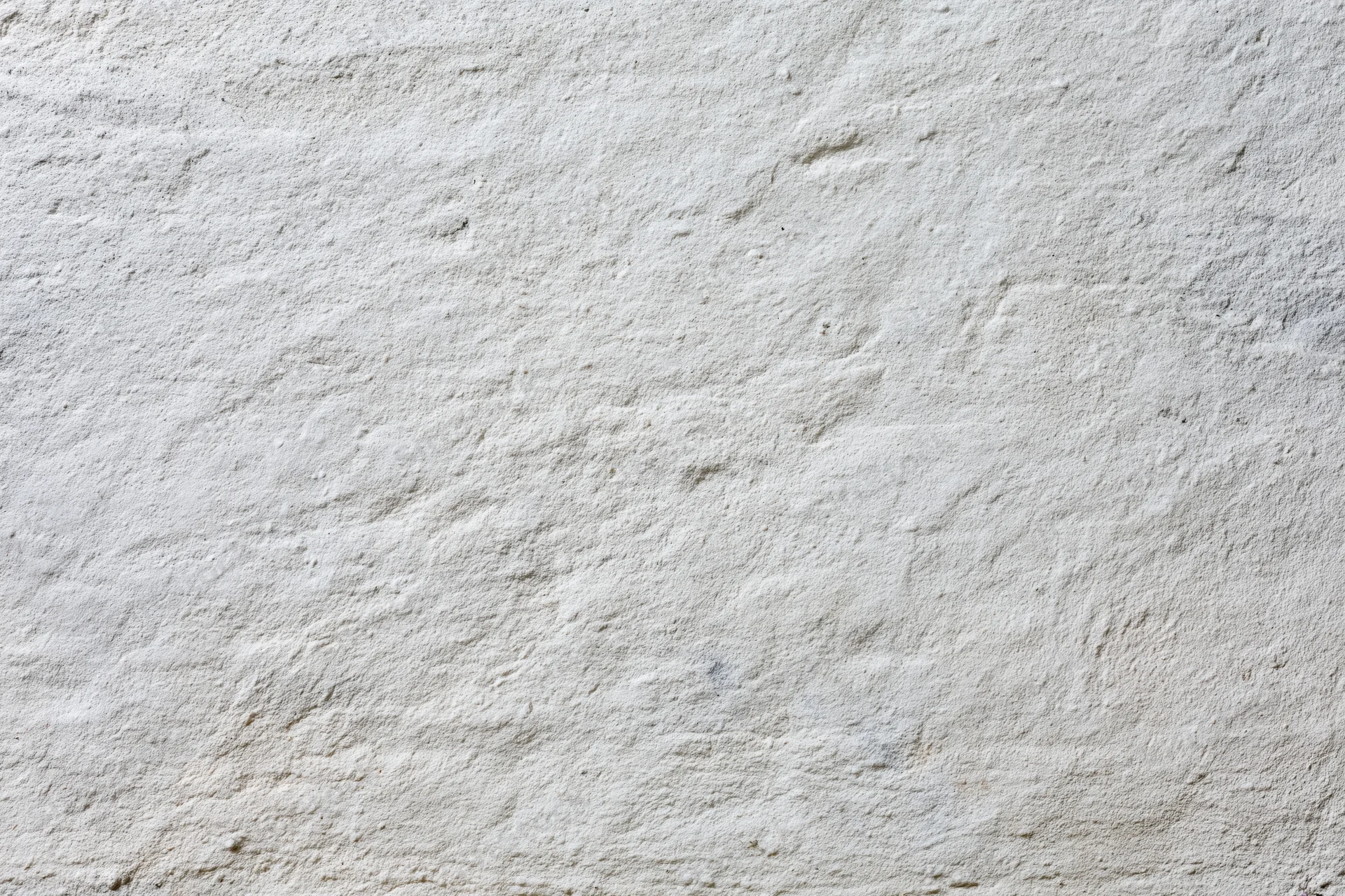 Close-up of a textured concrete wall surface filling the frame
