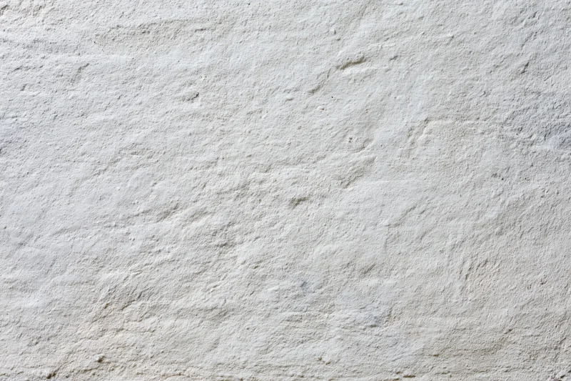 Close-up of a textured concrete wall surface filling the frame