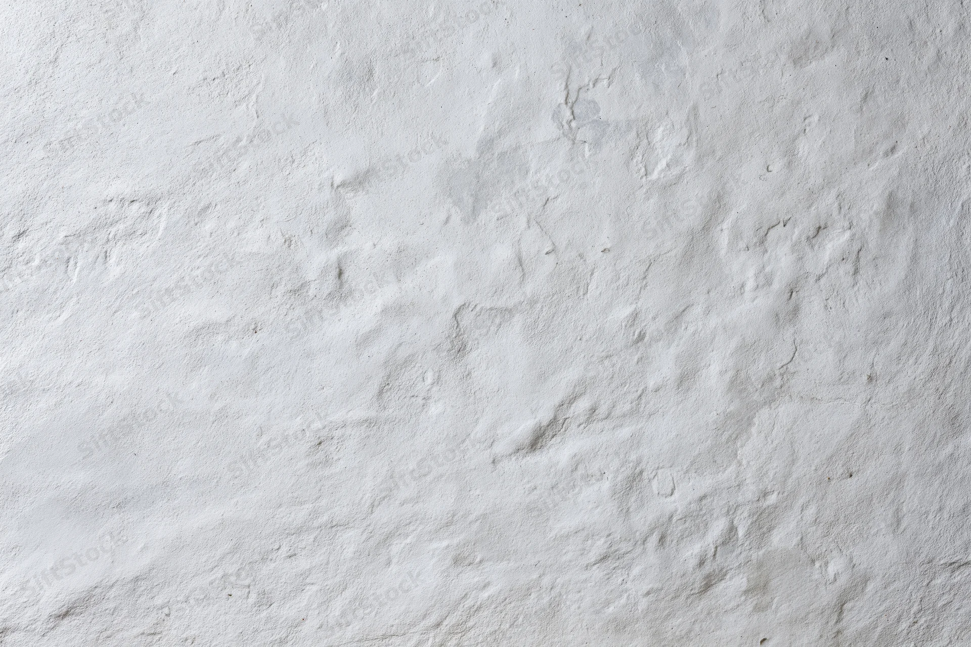 Close-up of a textured concrete wall surface filling the frame