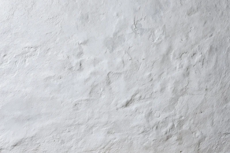 Close-up of a textured concrete wall surface filling the frame