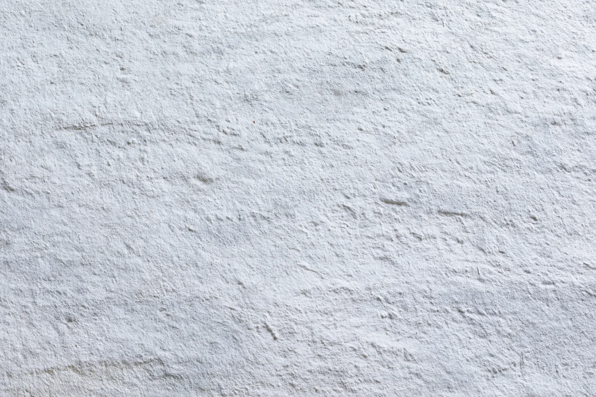 Flat concrete wall surface filling the frame with rough texture and gray tone
