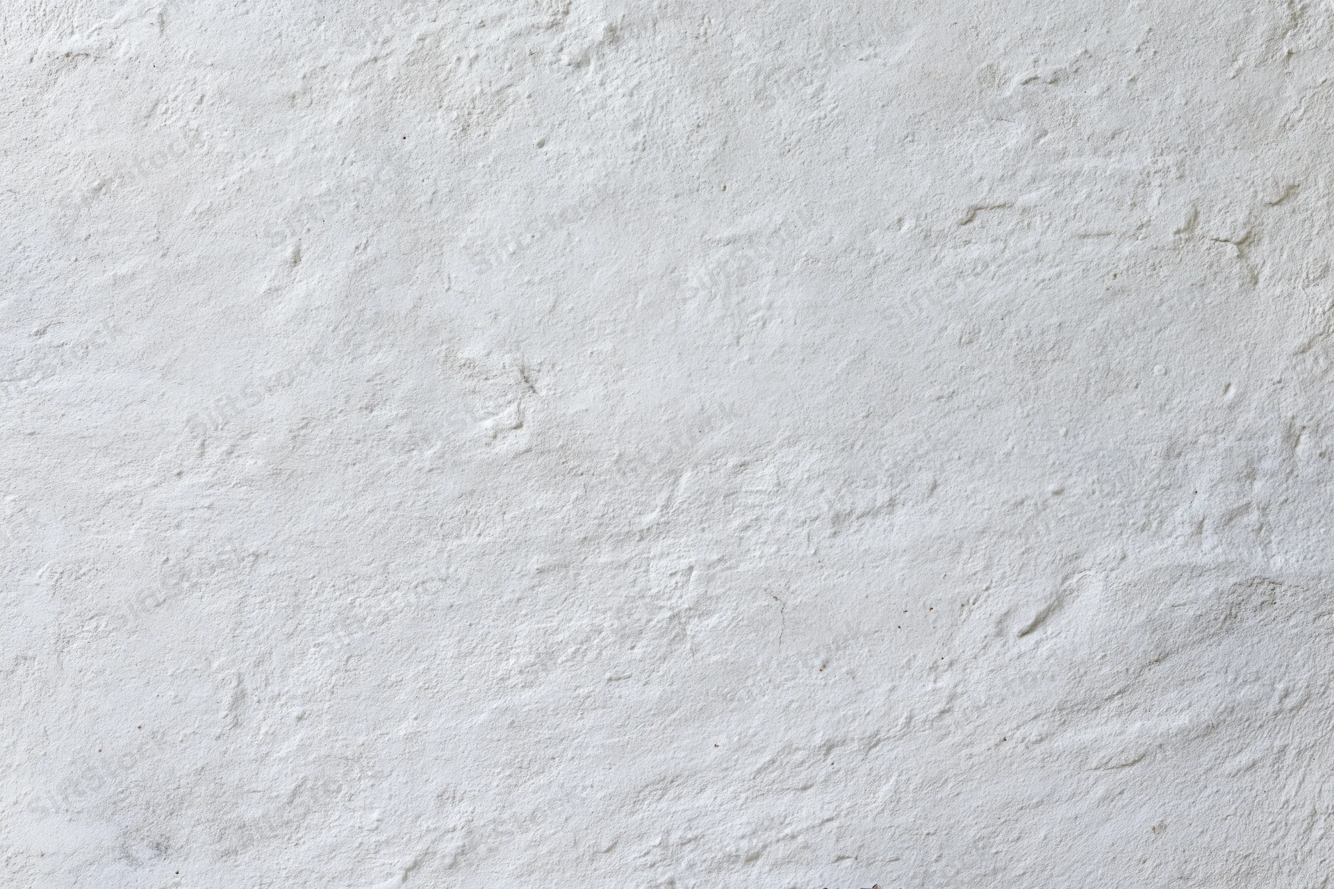 Flat concrete wall surface filling the frame in close-up view