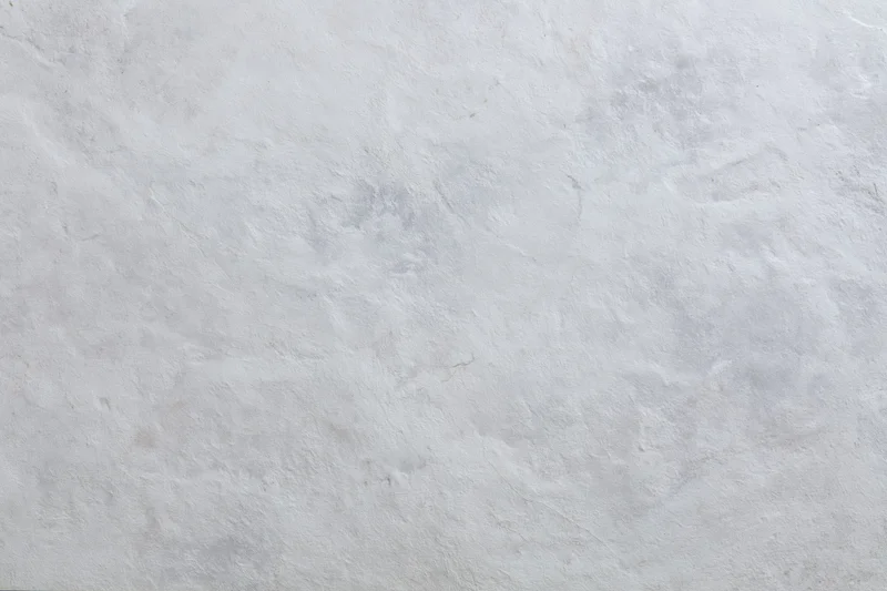Flat concrete wall surface filling the frame in close-up view