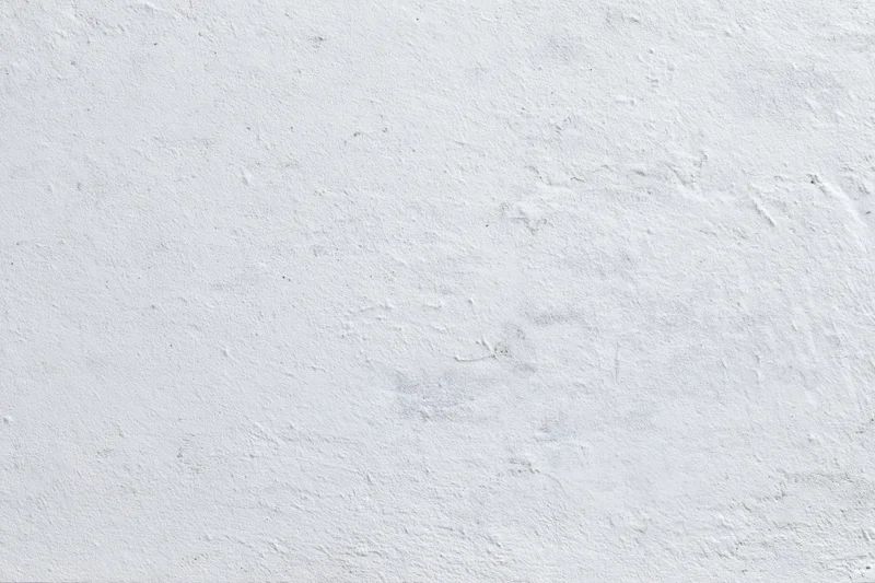 Close-up of a rough concrete wall surface filling the frame