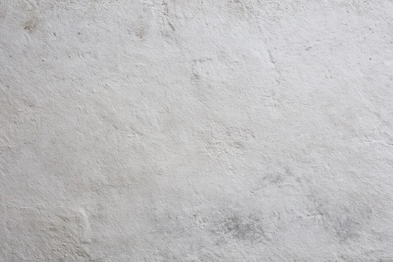 Close-up of a textured concrete wall surface filling the frame