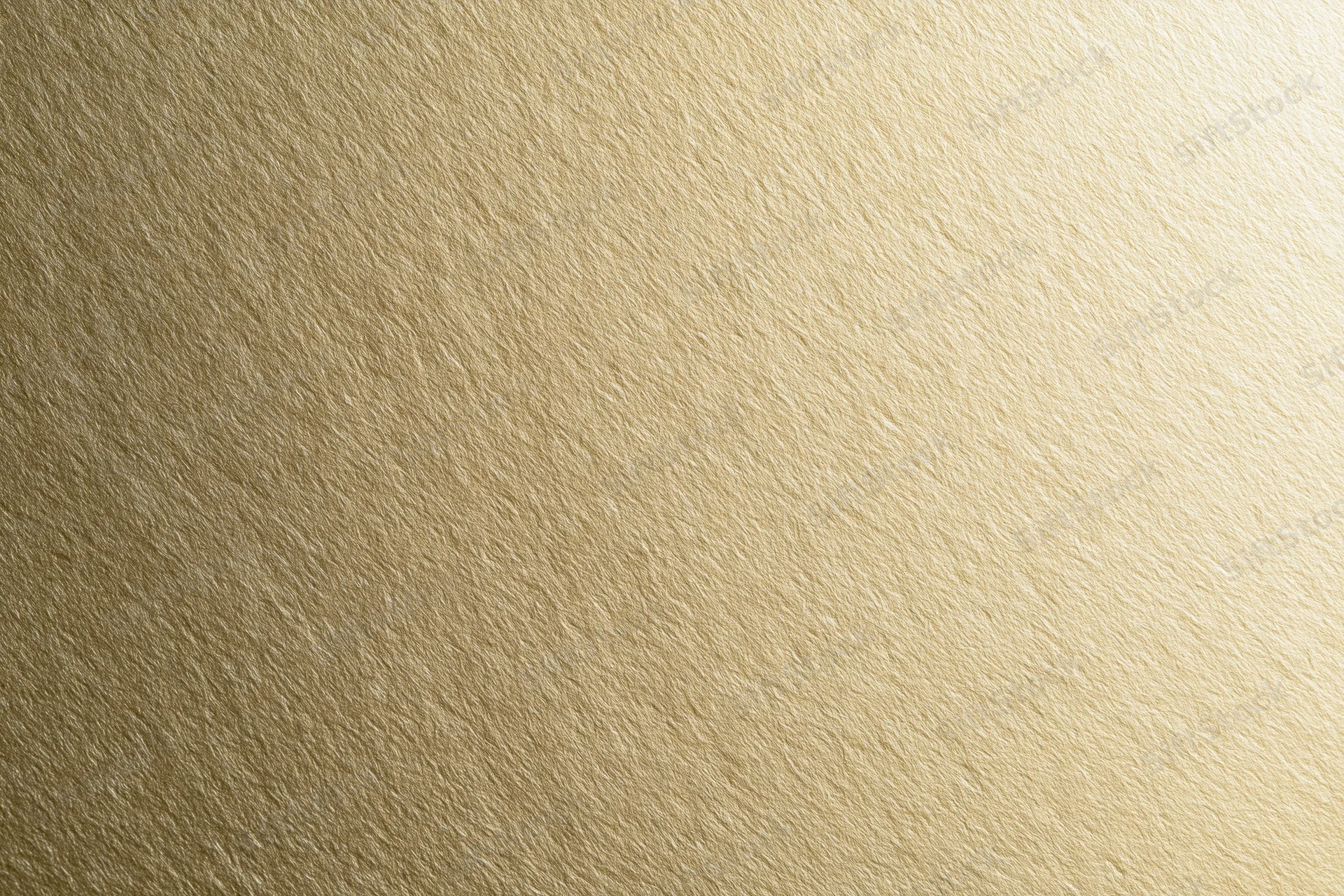Flat matte gold metallic surface filling the frame as a seamless background