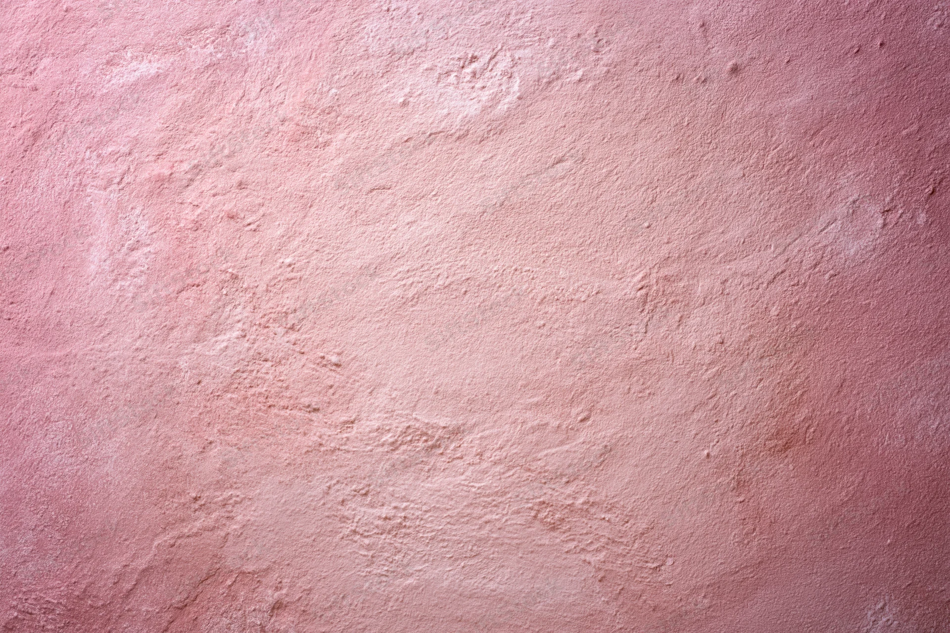 Matte pink textured surface filling the frame as a background