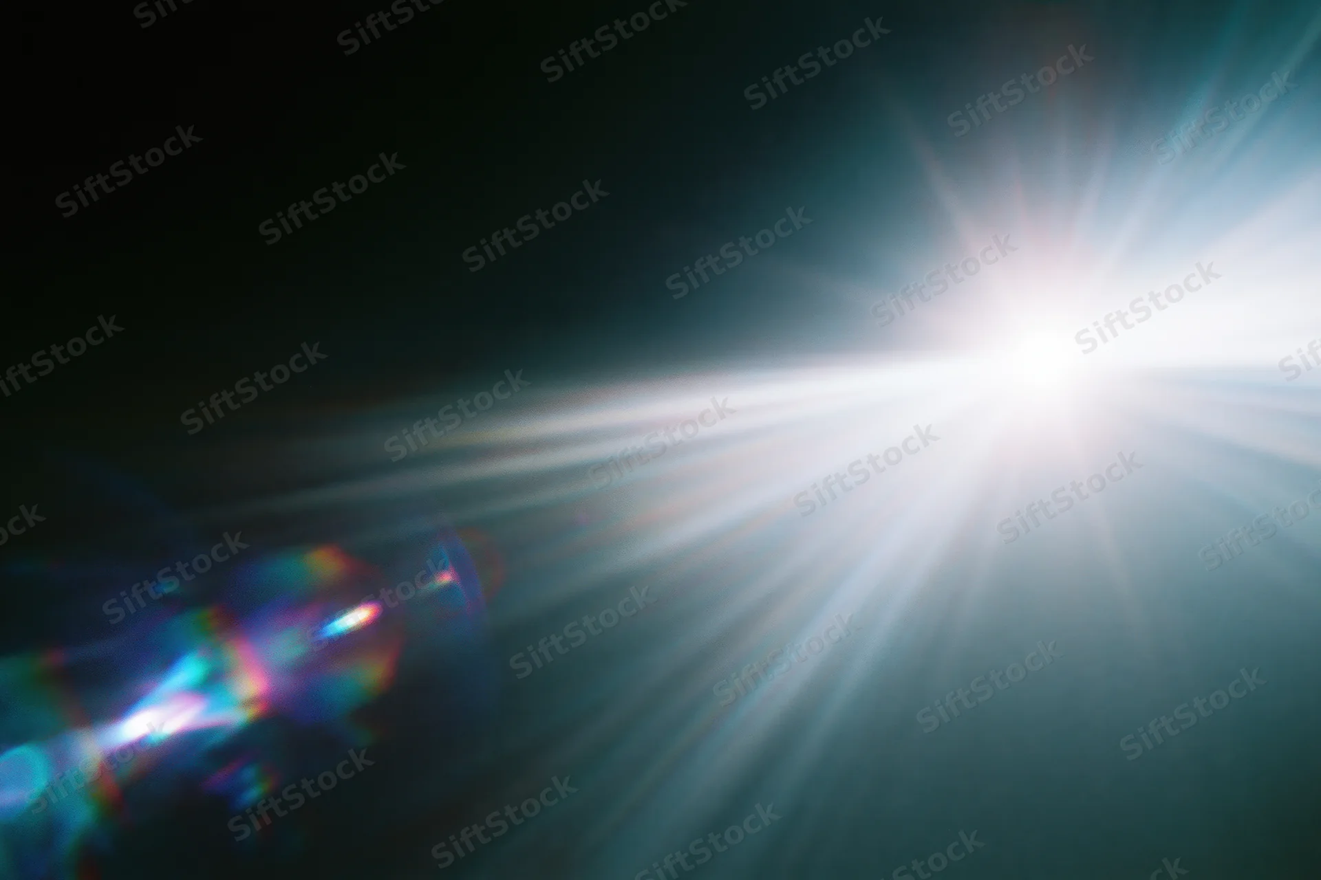Intense white light source blazing against a near-black background with lens flare and chromatic aberration
