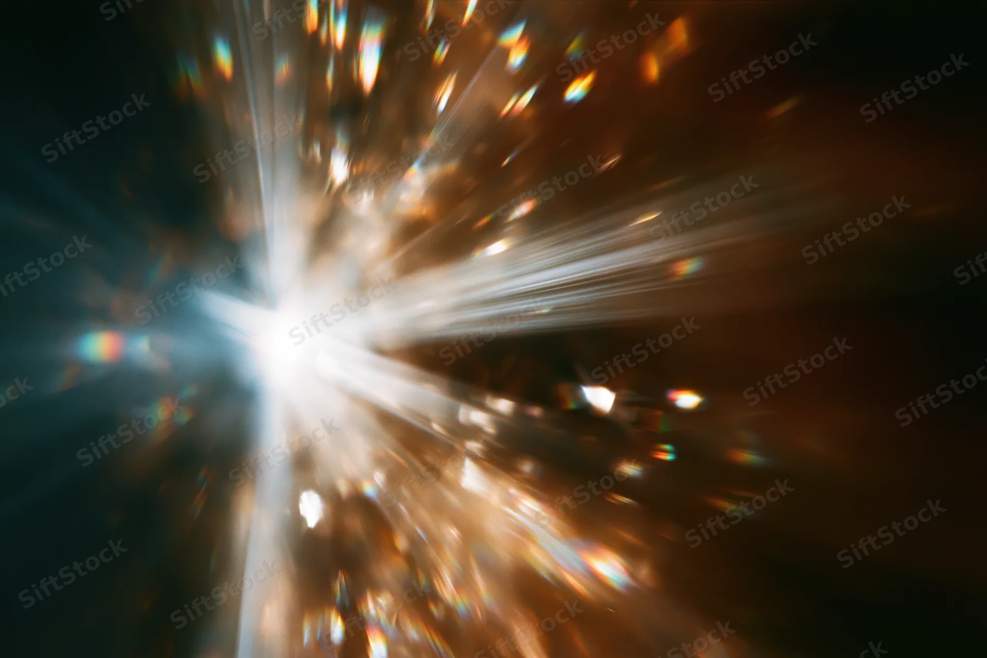 Light refracting through a crystal surface creating a radiant burst of color and glow
