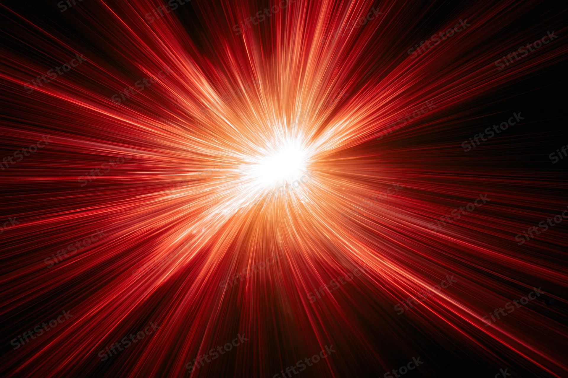 Radial light burst exploding from a bright white center against a dark background