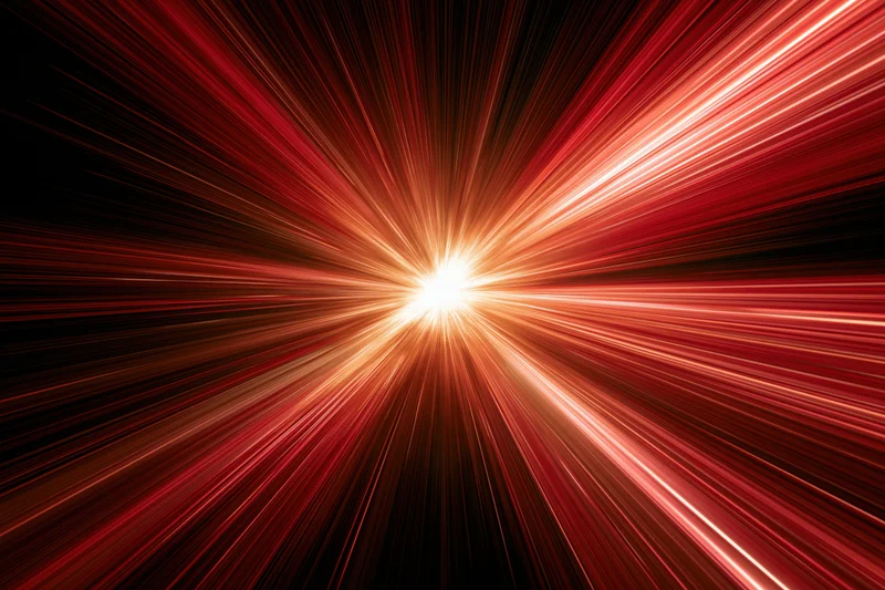 Radial light burst exploding from a central glowing point against a dark background