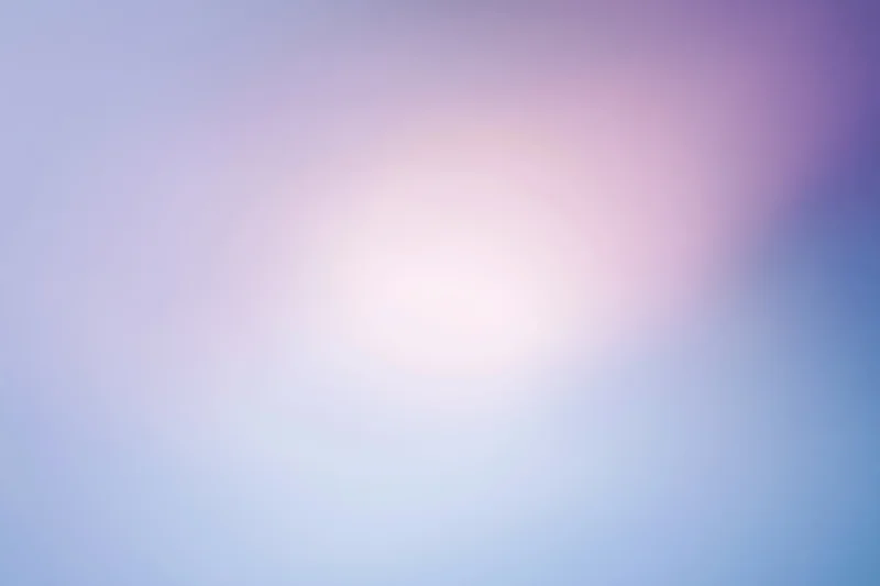 Smooth abstract gradient background with soft pastel colors transitioning from blue to purple and pink, full-frame composition