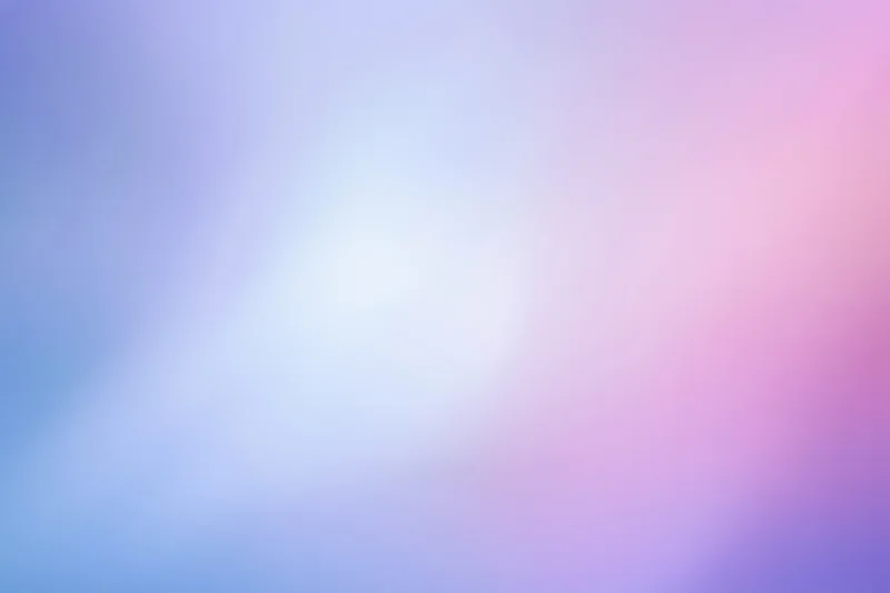 Smooth abstract gradient background transitioning from blue to pink and purple across the frame