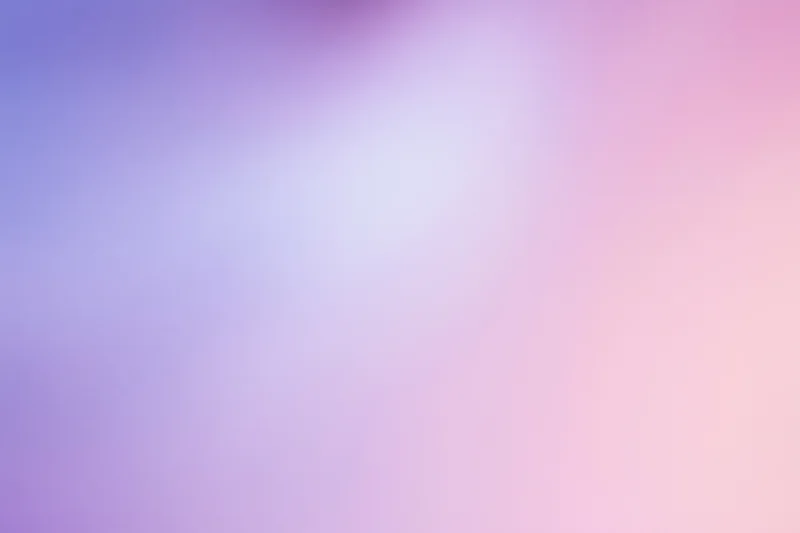 Smooth abstract gradient blending from purple to pink across the frame