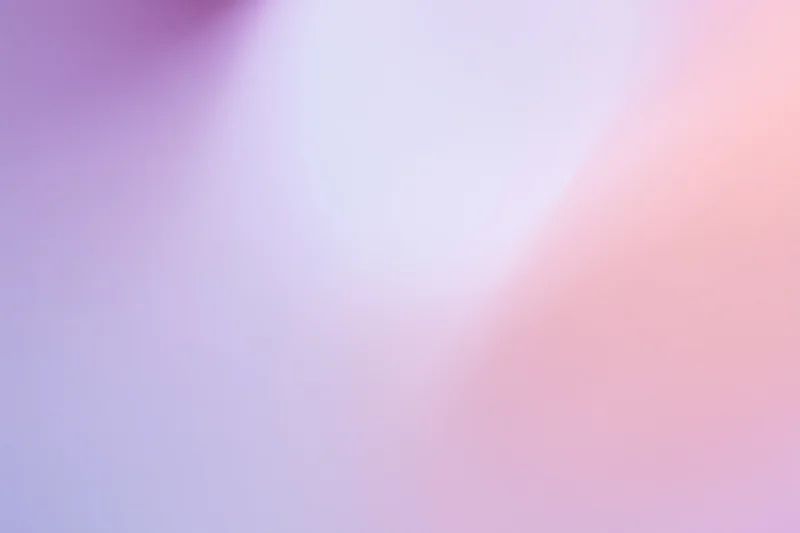 Smooth abstract gradient background with soft blended pastel colors transitioning from purple to pink and white