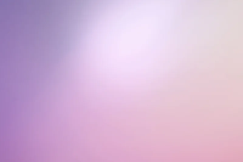 Smooth abstract gradient background blending from purple to pink with soft light transition