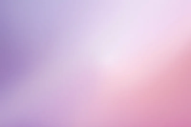 Smooth abstract gradient blending from purple to pink across the frame