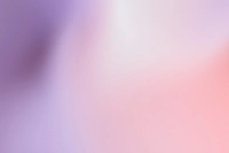 Smooth abstract gradient background with soft blend of pink and purple hues