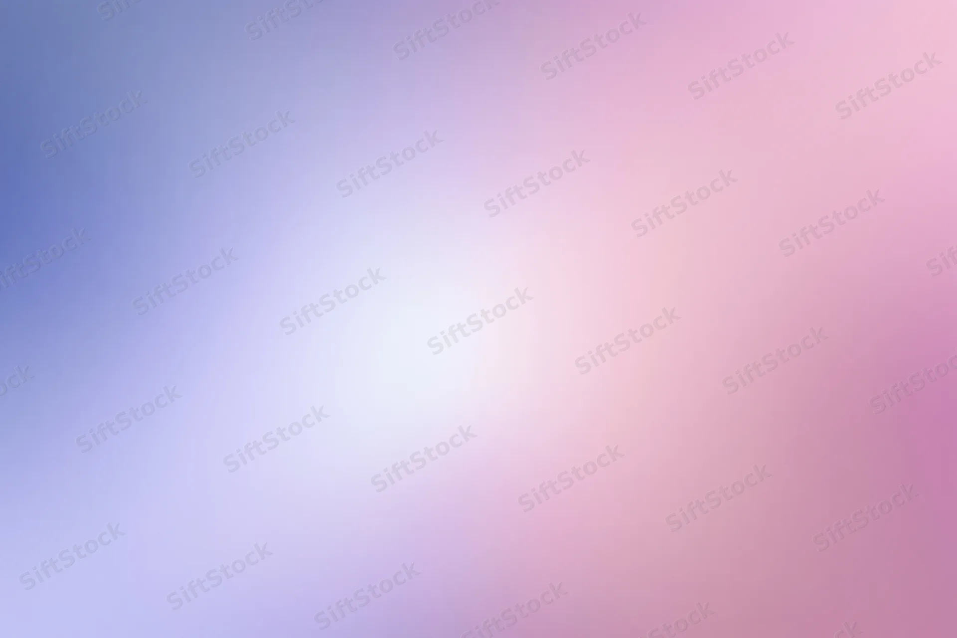 Soft abstract gradient background transitioning from blue to pink with smooth color blend